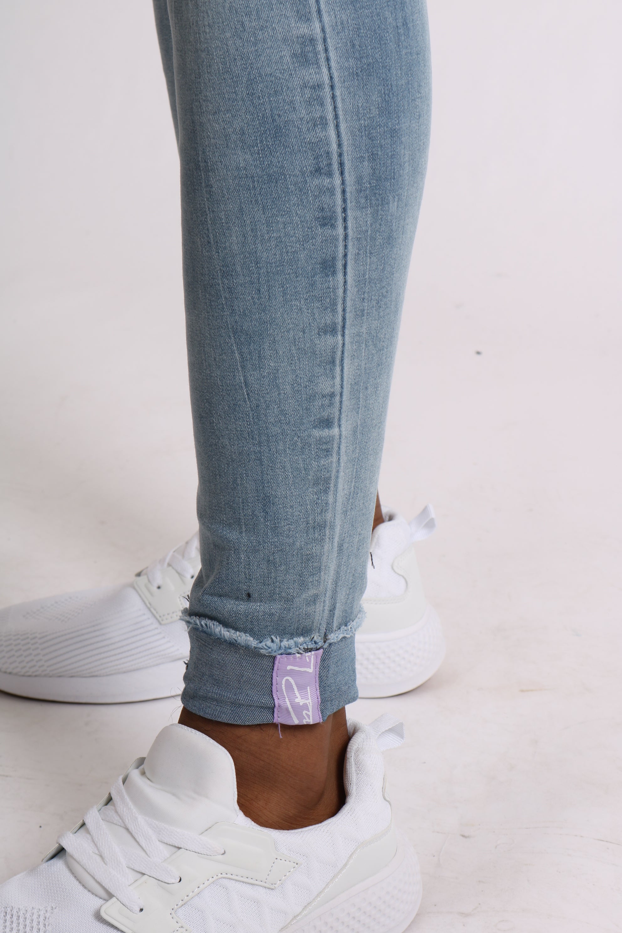 Light Wash Skinny Jeans With Signature Hem