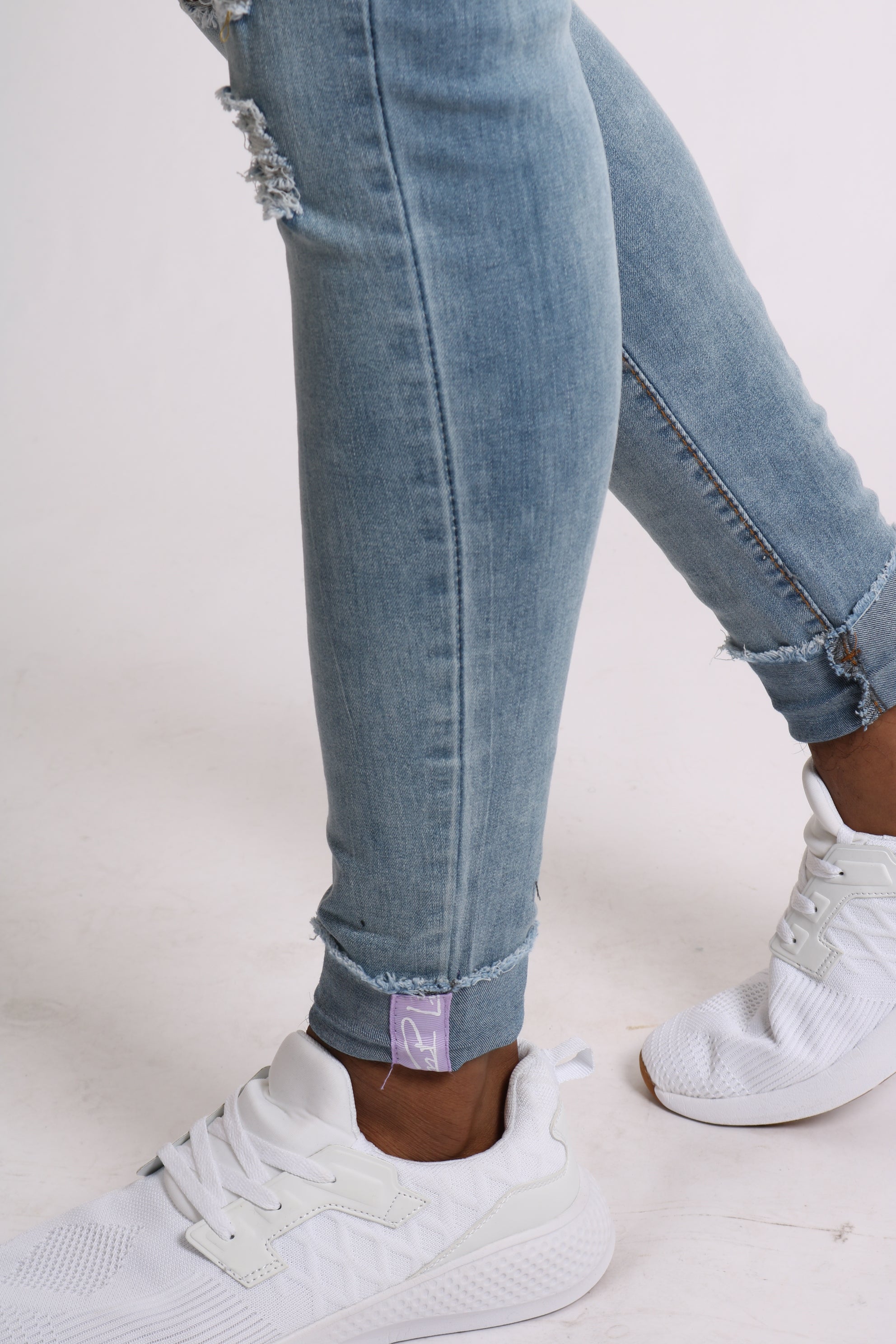 Light Wash Skinny Jeans With Signature Hem