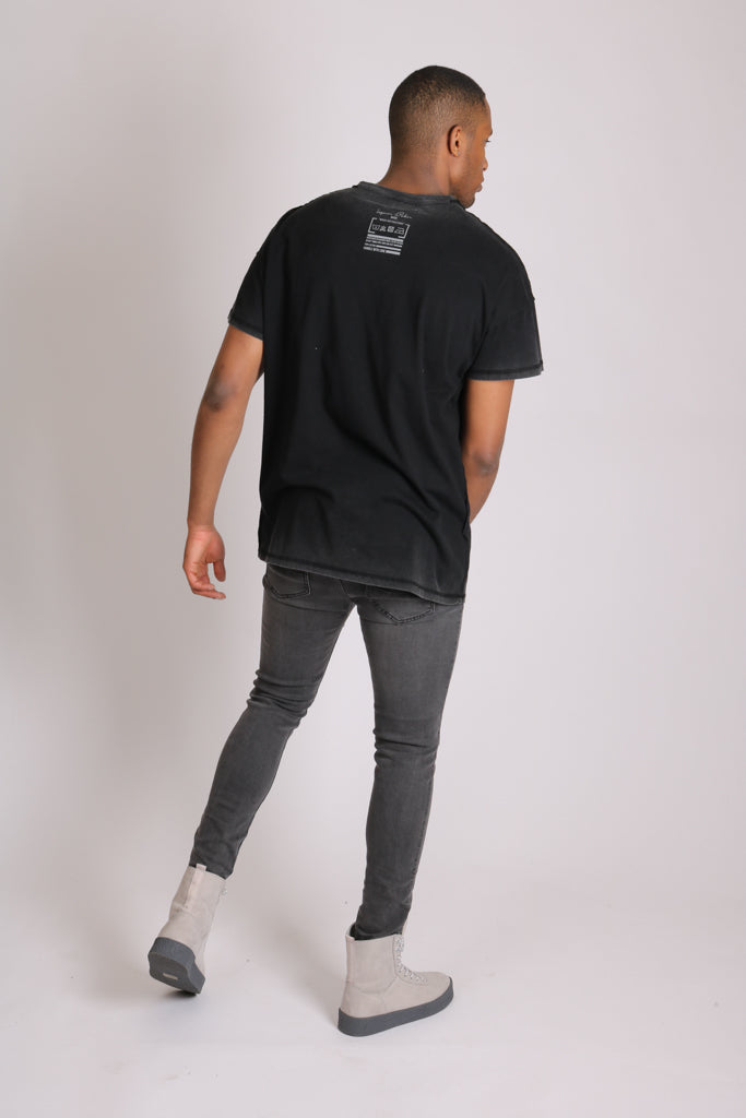 Logan Stretch Skinny Jeans In Washed Black With Distressing