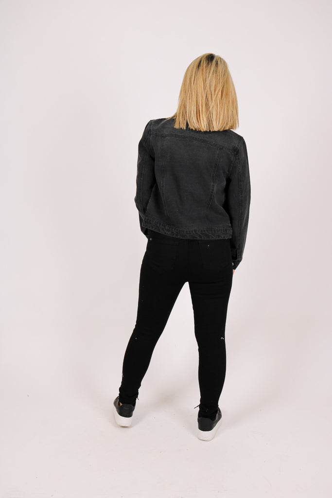 Mid-Rise Black Super Distressed Skinny