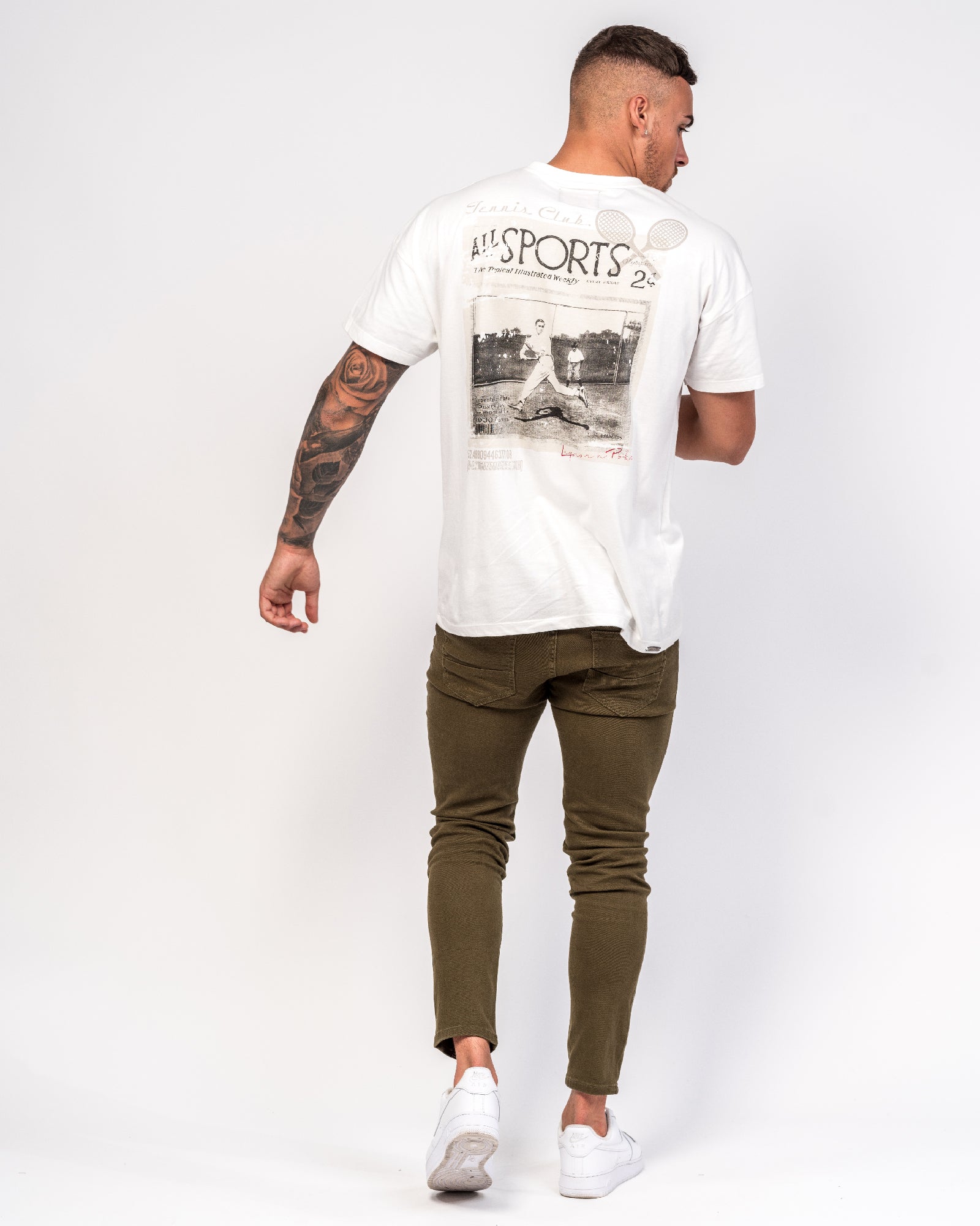 Logan Skinny Jeans With Distressing In Khaki