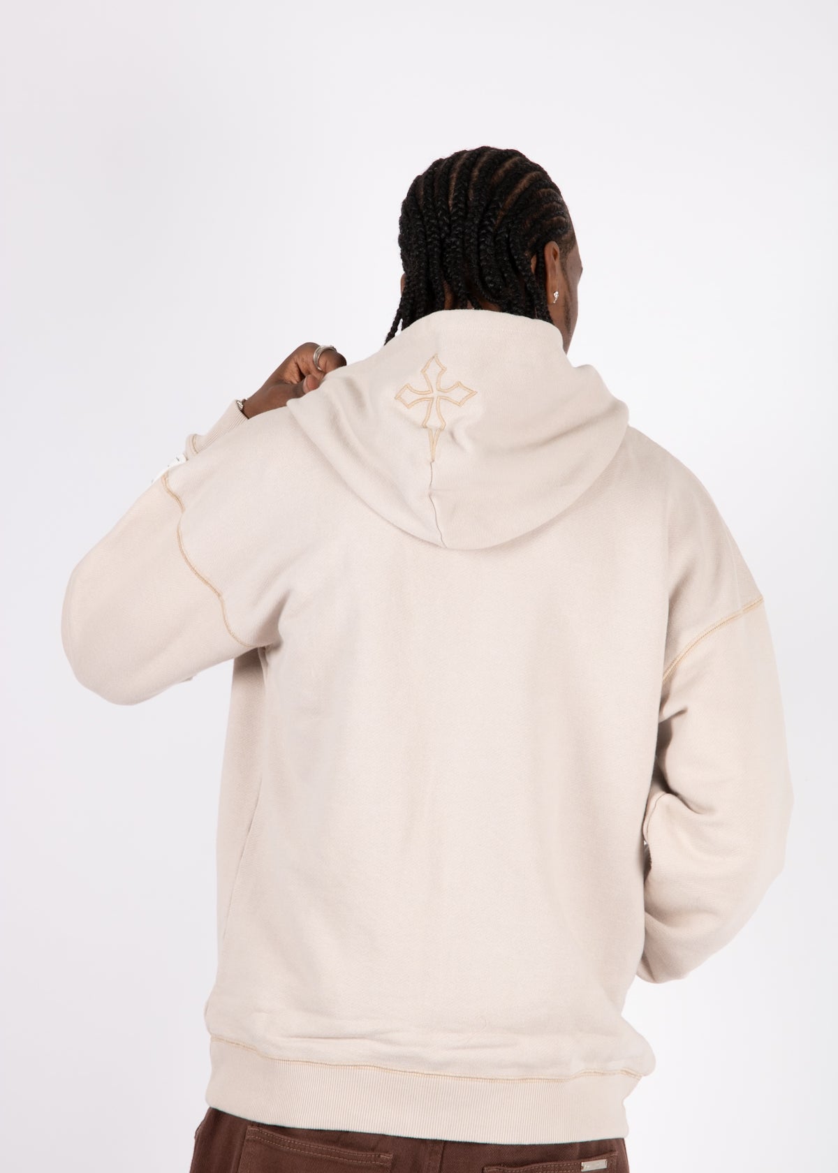 Liquor N Poker beige oversized zip hoodie graphic motif branded detail on model
