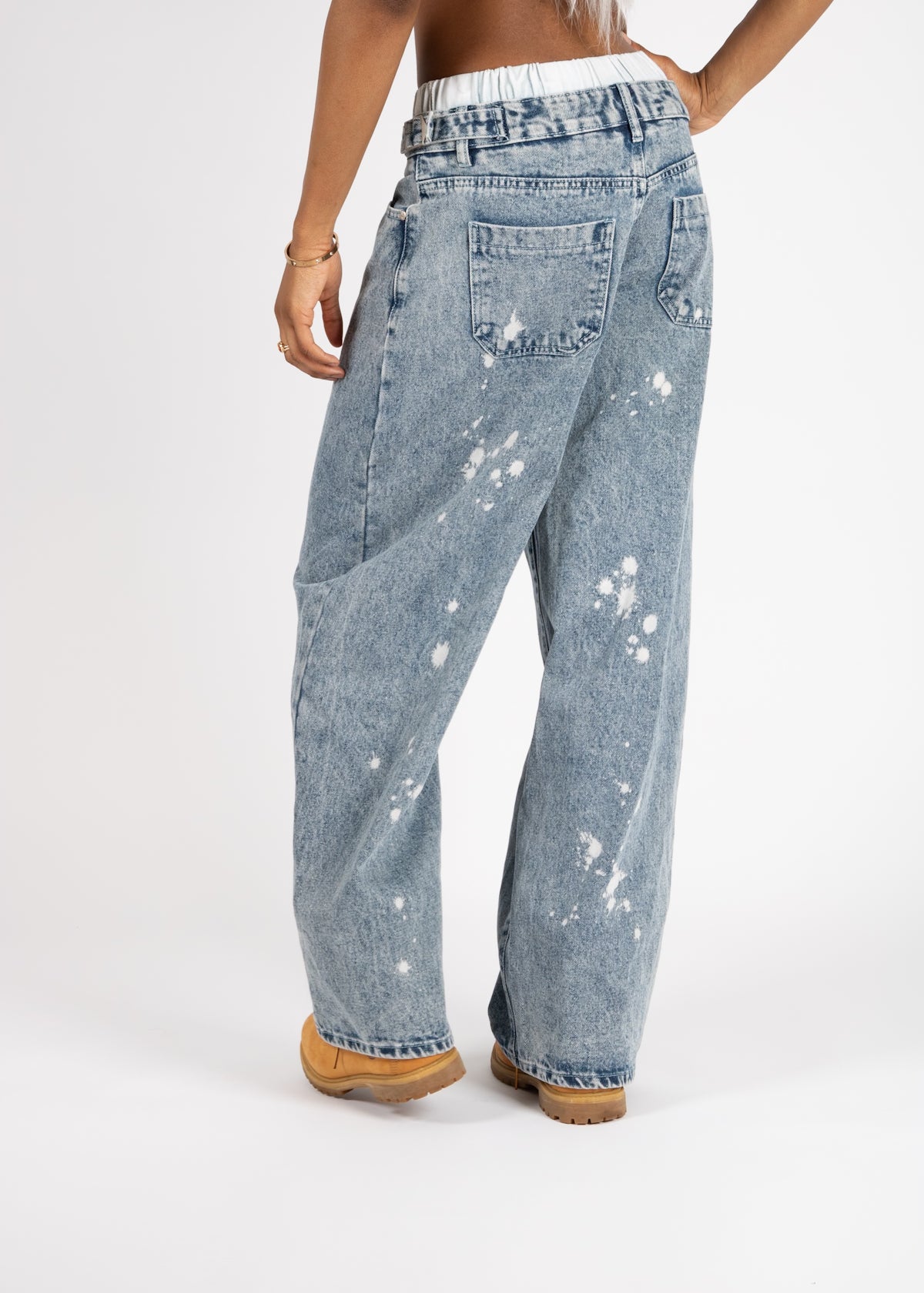 Liquor N Poker bleach wash baggy jeans low rise on model
