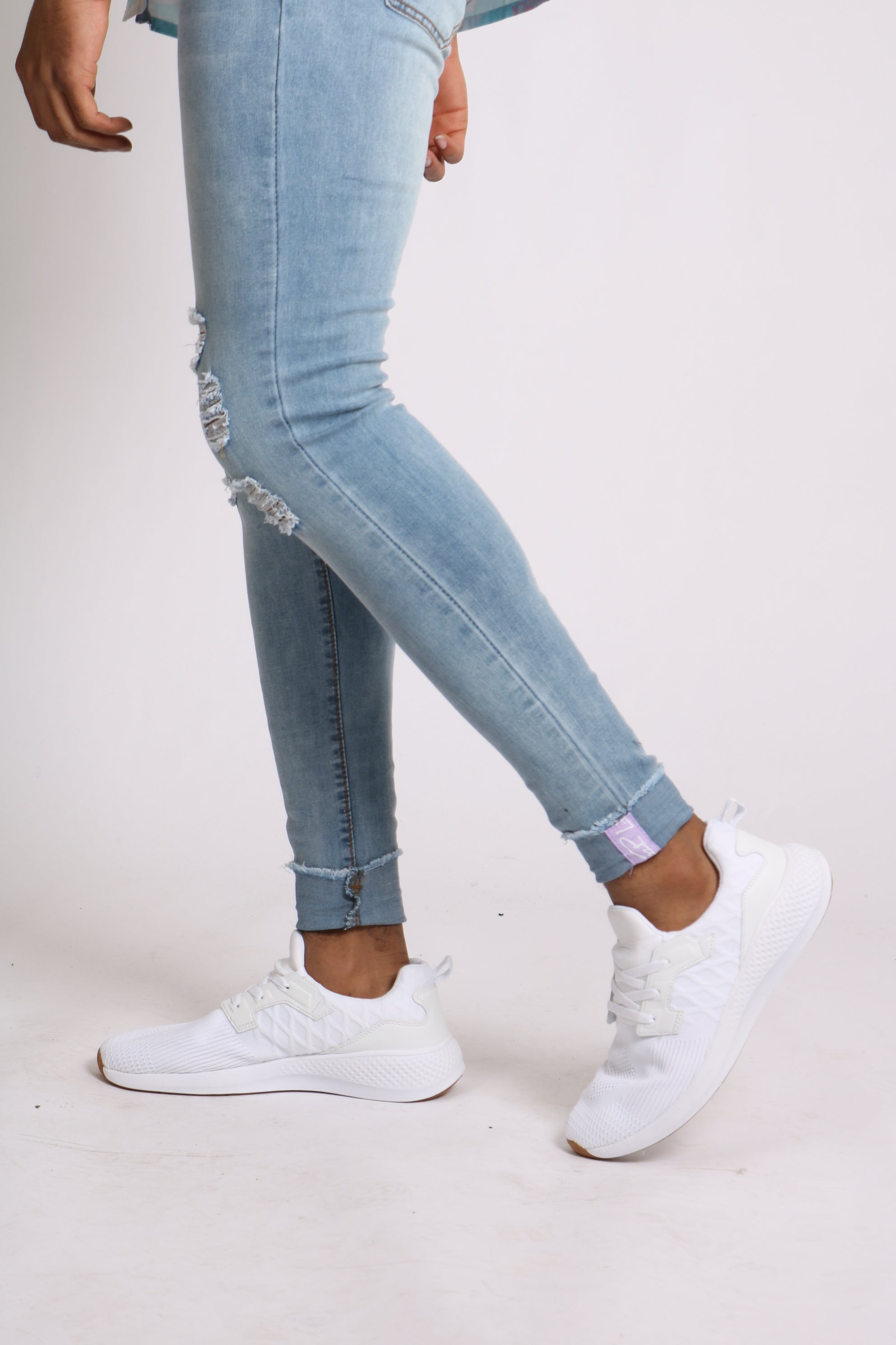 Light Wash Skinny Jeans With Signature Hem