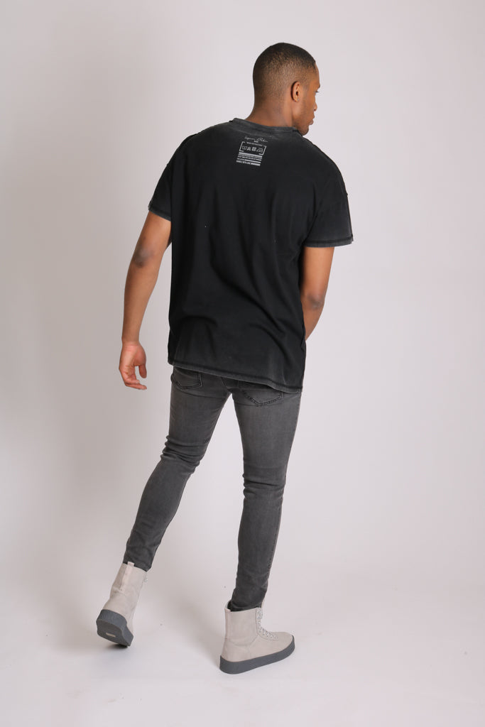 Logan Stretch Skinny Jeans In Washed Black With Distressing