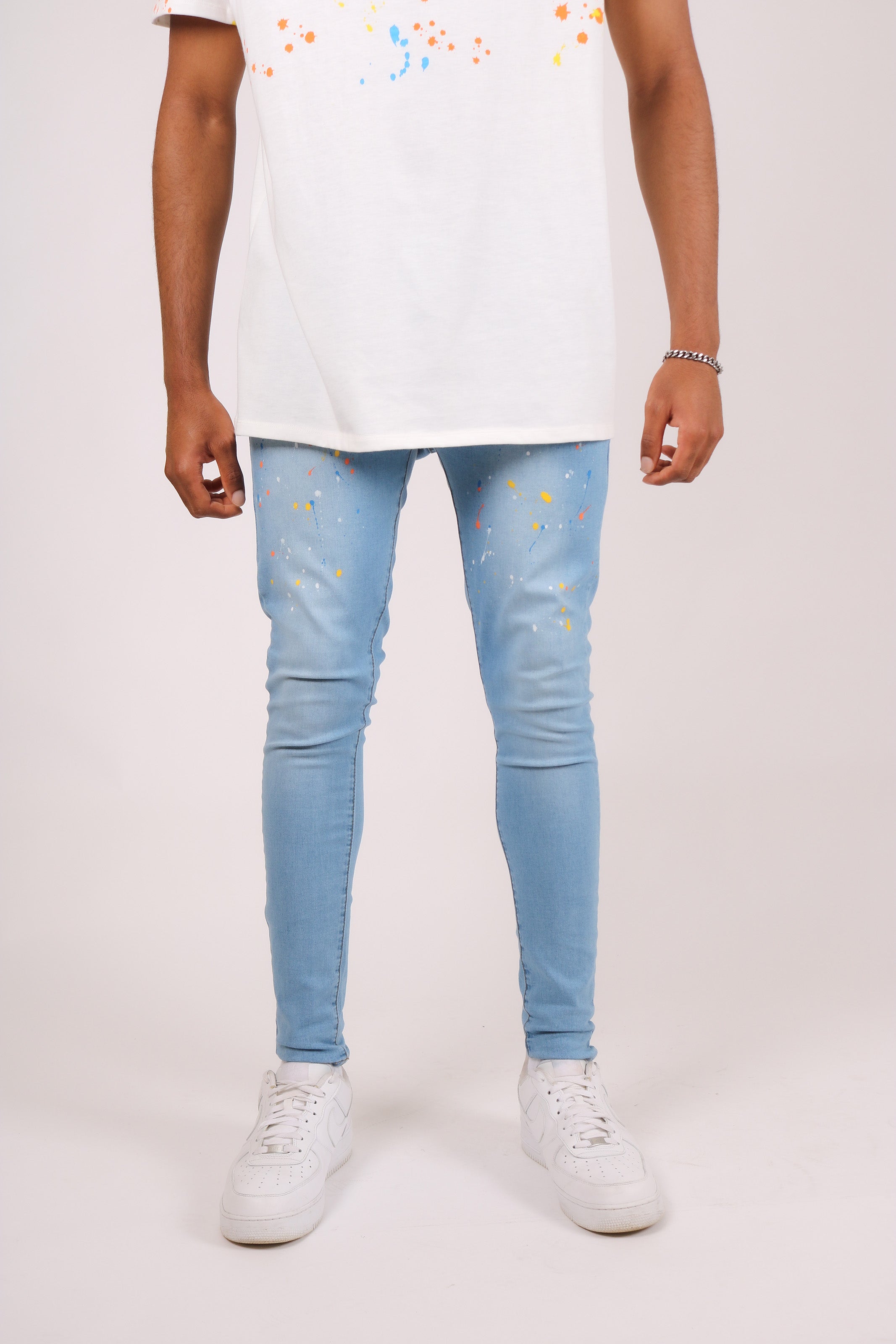 Logan Stonewash Paint Splatter Skinny Jeans