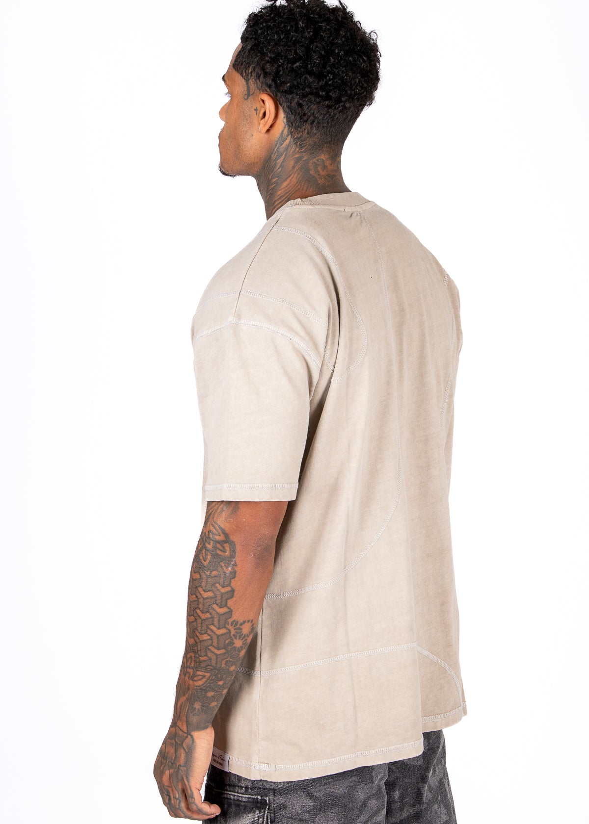 Liquor N Poker beige relaxed fit t-shirt with raw edge detail on model
