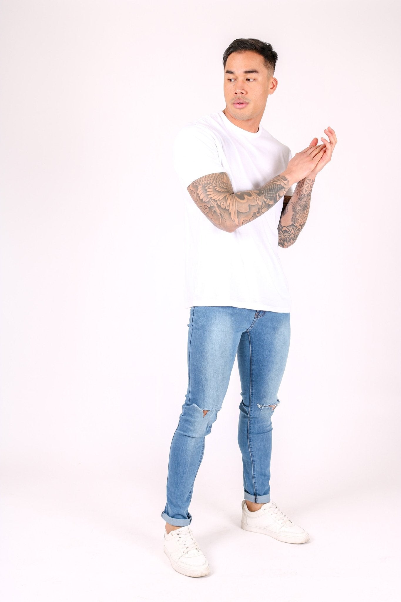 Logan Skinny Stretch Jeans In Light Stonewash With Ripped Knee - Liquor n Poker