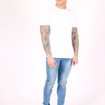 Logan Skinny Stretch Jeans In Light Stonewash With Ripped Knee - Liquor n Poker