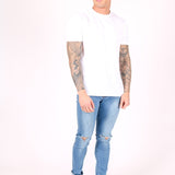 Logan Skinny Stretch Jeans In Light Stonewash With Ripped Knee - Liquor n Poker