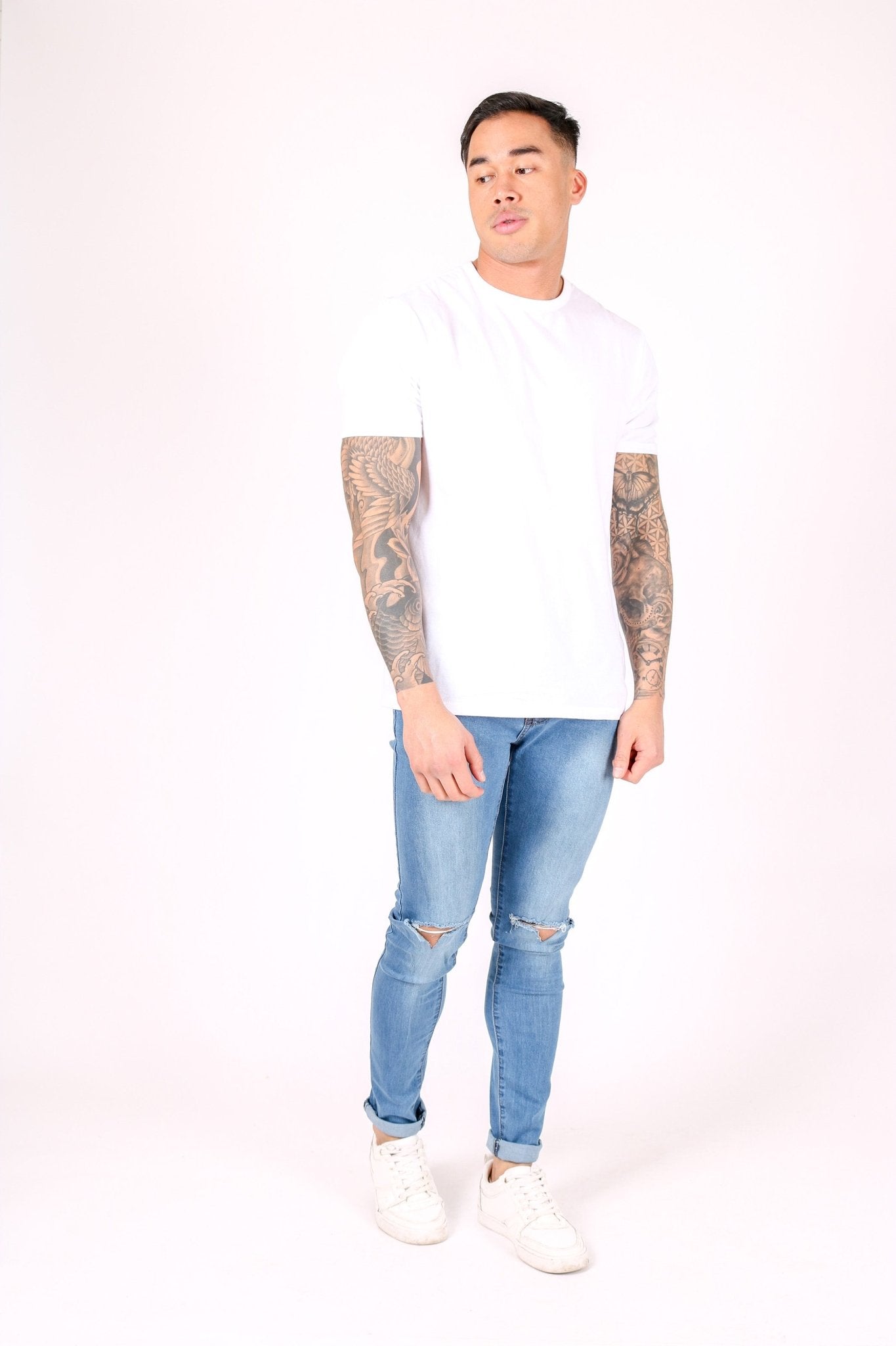 Logan Skinny Stretch Jeans In Light Stonewash With Ripped Knee - Liquor n Poker