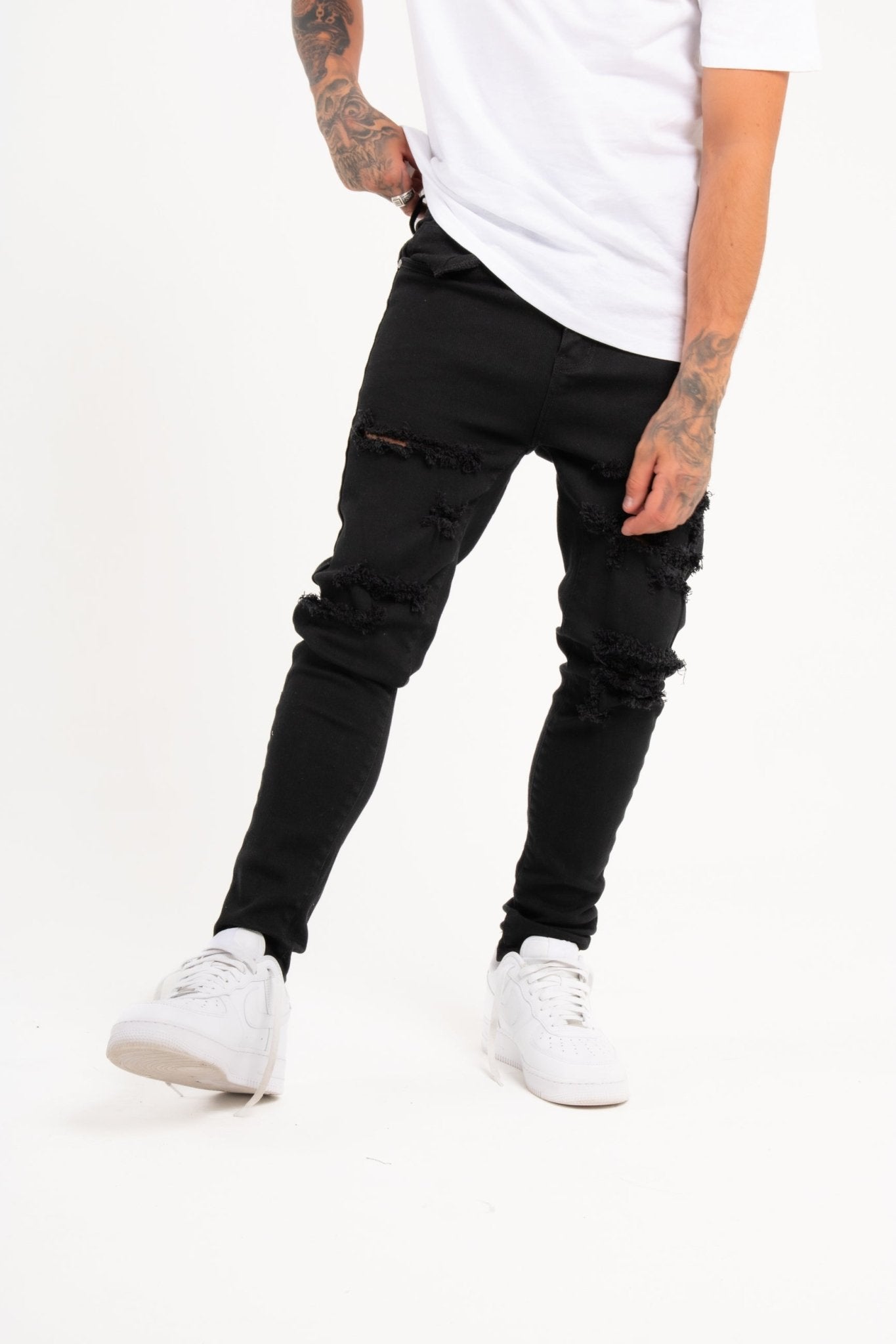 Logan Stretch Skinny Fit Jeans With Rips In Black - Liquor n Poker