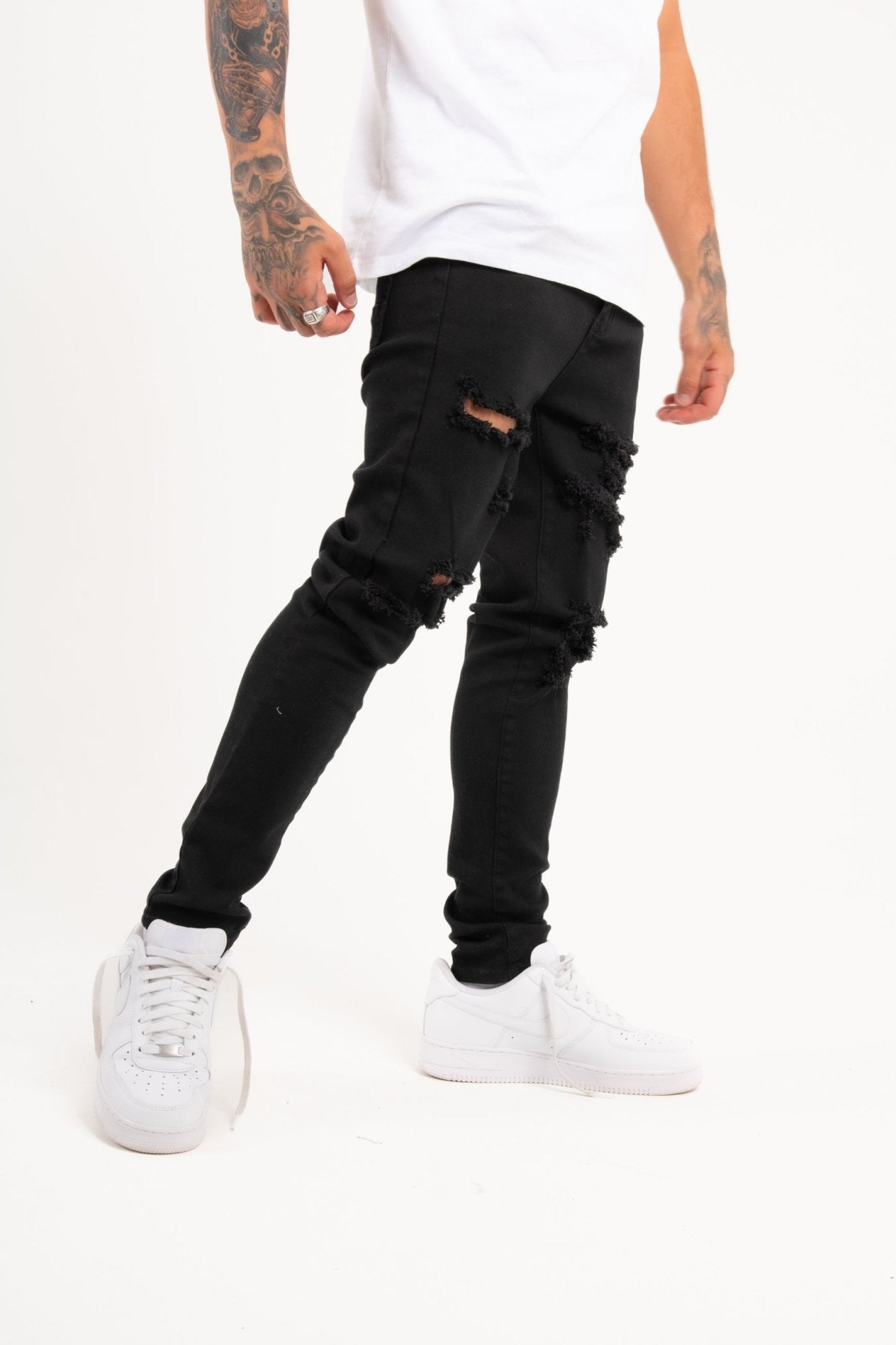 Logan Stretch Skinny Fit Jeans With Rips In Black - Liquor n Poker