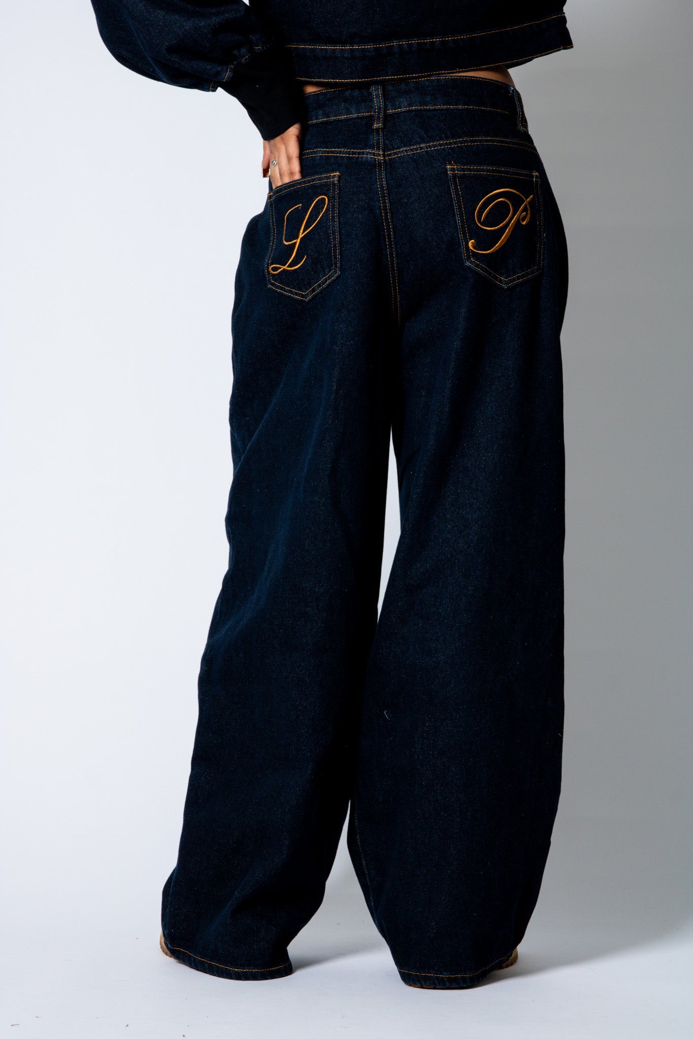 LOLA – Raw Indigo Baggy Pleated Horseshoe Jeans - Liquor n Poker