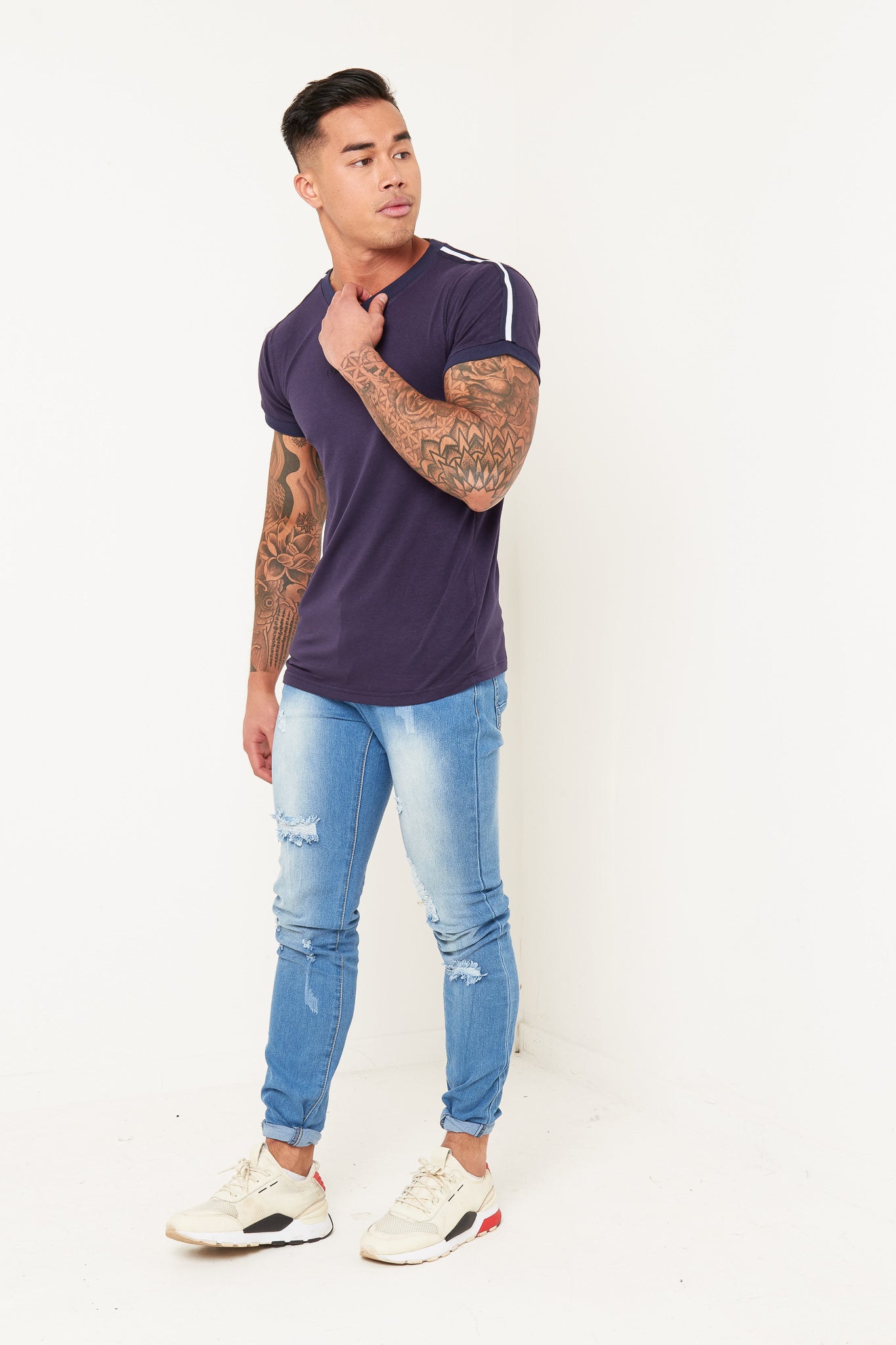 Logan Stretch Skinny Distressed Denim in Indigo Stonewash