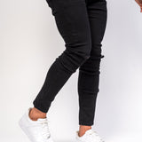 Logan Skinny Stretch Jeans in Light Black Twill with Ripped Knees