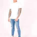 Logan Skinny Stretch Jeans In Light Stonewash With Ripped Knee - Liquor n Poker