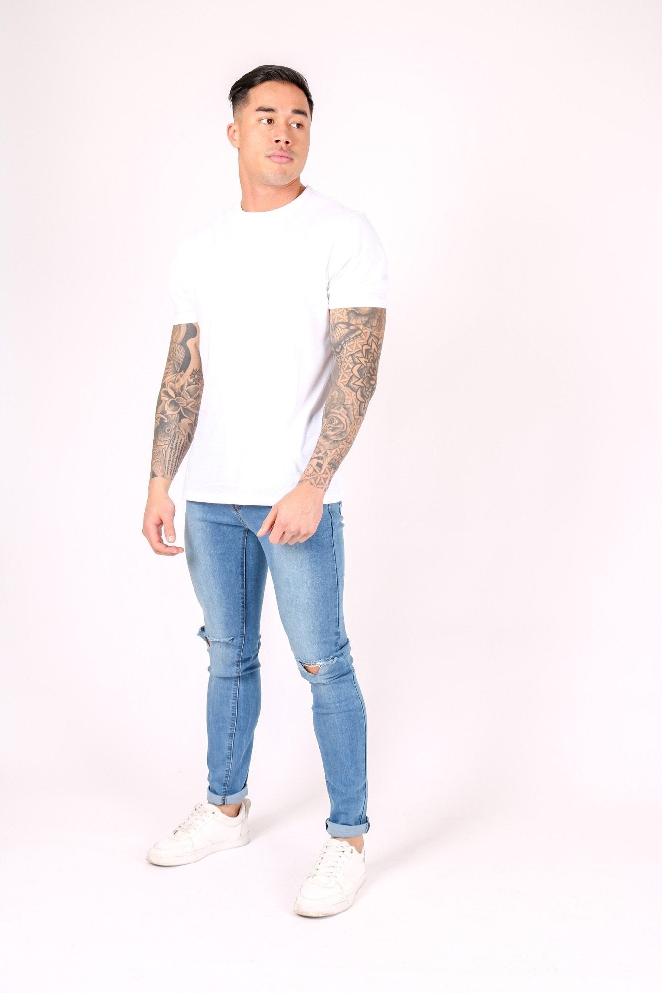 Logan Skinny Stretch Jeans In Light Stonewash With Ripped Knee - Liquor n Poker