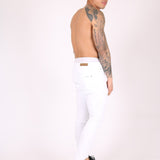 Logan Stretch Skinny Jeans In White With All Over Distressing - Liquor n Poker
