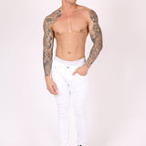 Logan Stretch Skinny Jeans In White With All Over Distressing - Liquor n Poker