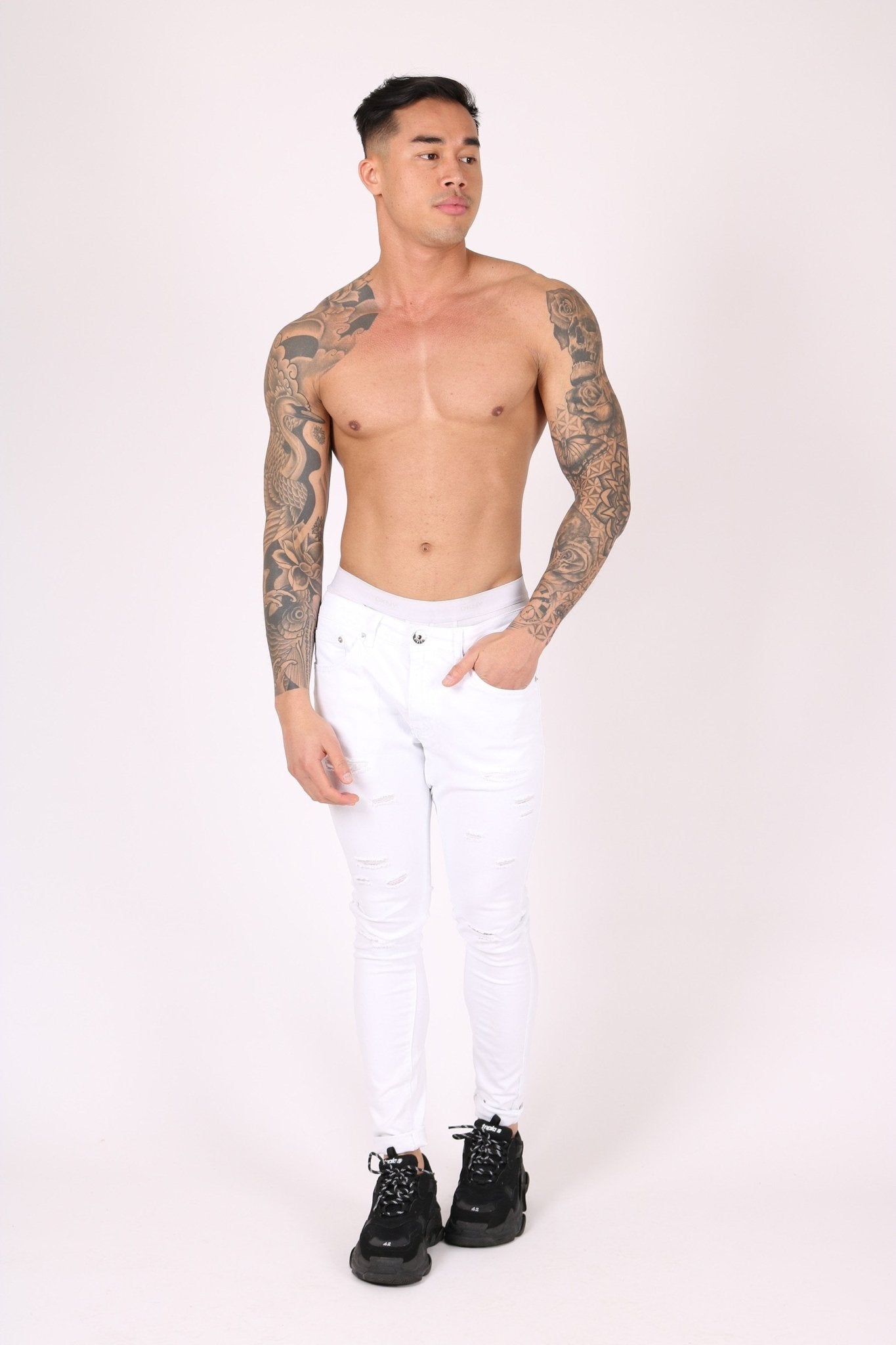 Logan Stretch Skinny Jeans In White With All Over Distressing - Liquor n Poker